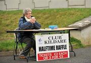 11 March 2012; Mary Heffernan, from Nurney, Co. Kildare, waits for supporters to arrive at the ground to sell tickets for the Kildare GAA supporters club halftime raffle. Allianz Football League Division 2, Round 4, Kildare v Derry, St Conleth's Park, Newbridge, Co. Kildare. Picture credit: Barry Cregg / SPORTSFILE