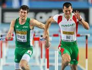 11 March 2012; Ireland's Ben Reynolds competes alongside Balázs Baji, Hungary, right, during their Semi-Final of the Men's 60m Hurdle event. Reynolds finished in 7th position, in a time of 7.80, during the final day of the 14th IAAF World Indoor Championships. Atakoy Athletics Arena, Bakirkoy, Istanbul, Turkey. Picture credit: Stephen McCarthy / SPORTSFILE