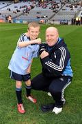 11 March 2012; Former Olympic Champion Michael Carruth with eight year old Jack Murphy, from Swords, Co. Dublin before the game. Jack was a special guest of the Dublin County Board at the game. Allianz Hurling League Division 1A, Round 2, Dublin v Cork, Croke Park, Dublin. Picture credit: Ray McManus / SPORTSFILE