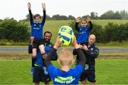 11 July 2017; Isa Nacewa and Richardt Strauss with young players Conor McFadden, age 10, from Balbriggan, Co. Dublin, and Tara Hickey, age 9, from Balbriggan, Co. Dublin, in action during the Bank of Ireland Leinster Rugby Summer Camp at Balbriggan RFC in Dublin. Photo by Eóin Noonan/Sportsfile