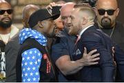 July 11 2017; Floyd Mayweather of USA, left, and Conor McGregor of Ireland face off on stage during the world tour press conference to promote the upcoming Mayweather vs McGregor boxing fight at Staples Center in Los Angeles, USA.  Photo by Gary A. Vasquez/Sportsfile