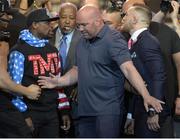 July 11 2017; Floyd Mayweather of USA, left, and Conor McGregor of Ireland face off on stage during the world tour press conference to promote the upcoming Mayweather vs McGregor boxing fight at Staples Center in Los Angeles, USA.  Photo by Gary A. Vasquez/Sportsfile