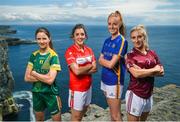 13 July 2017; Stars of the TG4 All Ireland Championships assembled at the famous Dún Aengus on Inis Mór in the Aran Islands to launch the 2017 TG4 All Ireland Championships. The championship gets underway when the preliminary rounds take place on July 22nd as 36 counties begin the journey that will take them to Croke Park on September 24th. TG4 also announced their search for the #properfan that will take place throughout the 2017 TG4 All Ireland Champinships. Pictured are ladies footballers, from left, Niamh O'Sullivan of Meath, Ciara o'Sullivan of Cork, Aishling Moloney of Tipperary, and Sinead Burke of Galway, at Dún Aengus, Inis Mór, Aran Islands, Co. Galway.  Photo by Seb Daly/Sportsfile