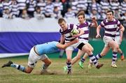 13 March 2012; John Molony, Clongowes Wood College SJ, with support from team-mates Rowan Osbourne, right, and Hugo McDermott, is tackled by Max Deegan, St. Michael's College. Powerade Leinster Schools Junior Cup Semi-Final, Clongowes Wood College SJ v St. Michael's College, Donnybrook Stadium, Donnybrook, Dublin. Picture credit: Barry Cregg / SPORTSFILE