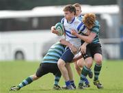 14 March 2012; Gary Fearon, St. Andrew’s College, in action against Billy O'Reilly, left, and Michael O'Toole, St. Gerard’s School. Fr. Godfrey Cup Final, St. Gerard’s School v St. Andrew’s College, Templeville Road, Dublin. Picture credit: Brian Lawless / SPORTSFILE