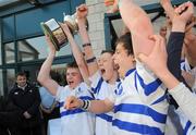 14 March 2012; St. Andrew’s College captain Gary Fearon lifts the cup`alongside his team-mates. Fr. Godfrey Cup Final, St. Gerard’s School v St. Andrew’s College, Templeville Road, Dublin. Picture credit: Brian Lawless / SPORTSFILE