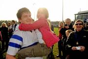 14 March 2012; Lucy Turner, age 7, celebrates with her cousin Ryan Bradley, St. Andrew’s College, after the match. Fr. Godfrey Cup Final, St. Gerard’s School v St. Andrew’s College, Templeville Road, Dublin. Picture credit: Brian Lawless / SPORTSFILE