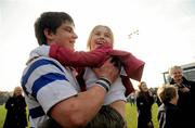 14 March 2012; Lucy Turner, age 7, celebrates with her cousin Ryan Bradley, St. Andrew’s College, after the match. Fr. Godfrey Cup Final, St. Gerard’s School v St. Andrew’s College, Templeville Road, Dublin. Picture credit: Brian Lawless / SPORTSFILE