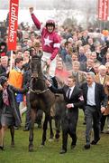 15 March 2012; Jockey Davy Russell, aboard Sir des Champs, celebrates with owner Michael O'Leary after winning the Jewson Novices' Steeple Chase. Cheltenham Racing Festival, Prestbury Park, Cheltenham, England. Picture credit: Brendan Moran / SPORTSFILE