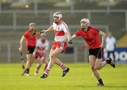 18 March 2012; Oisin McCloskey, Derry, in action against Aaron O'Prey, Down. Allianz Hurling League, Division 2A, Round 3, Down v Derry, Pairc Esler, Newry, Co. Down. Photo by Sportsfile