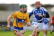 18 March 2012; Sean Collins, Clare, in action against Joe Fitzpatrick, Laois. Allianz Hurling League, Division 1B, Round 3, Laois v Clare, O'Moore Park, Portlaoise, Co. Laois. Picture credit: Diarmuid Greene / SPORTSFILE