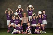 19 March 2012; In attendance at the Aviva FAI Soccer Sisters Photocall are TV presenter Kirsteen O'Sullivan with children, back row, from left to right, Georgia Rowan, age 11, from Dublin, Honey Gannon, age 7, from Dublin, Emma Kieran, age 7, from Dublin, Abbie Larkin, age 7, from Dublin, Ruby Rowan, age 8, from Dublin, Alix Mendez, age 7, from Cork, Jessie Mendez, age 11, from Cork, and Chloe Gannon, age 11, from Dublin, and front row, from left, Chloe Kiernan, age 11, from Dublin, Danielle Joyce, age 7, from Dublin, Martha Bartosiak, age 9, from Dublin. Aviva Stadium, Lansdowne Road, Dublin. Picture credit: David Maher / SPORTSFILE