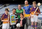 21 March 2012; The GAA have announced the results of their inaugural 'Off The Booze and On The Ball' health campaign, driven by the association's Alcohol and Substance Abuse Prevention programme. With over 250 clubs registered and an estimated 2500 participants taking up the 'Pint Sized Challenge' of abstaining from alcohol for the month of January, the winning clubs were Currins, Co. Monaghan, Erin's Isle, Dublin, Midleton, Cork, and Kinvara, Galway. In attendance at the announcement is Roisin Shortall, Minister of State at the Department of Health, with, from left, Dylan McMahon, Kinvara, Galway, Pearse McCarthy, Midleton, Cork, Niall Crossan, Erin's Isle, Dublin, Ben Clerkin, Currin, Monaghan, and Neil Huban, Kinvara, Galway. Croke Park, Dublin. Picture credit: Brendan Moran / SPORTSFILE