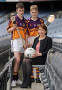 21 March 2012; The GAA have announced the results of their inaugural 'Off The Booze and On The Ball' health campaign, driven by the association's Alcohol and Substance Abuse Prevention programme. With over 250 clubs registered and an estimated 2500 participants taking up the 'Pint Sized Challenge' of abstaining from alcohol for the month of January, the winning clubs were Currins, Co. Monaghan, Erin's Isle, Dublin, Midleton, Cork, and Kinvara, Galway. In attendance at the announcement is Roisin Shortall, Minister of State at the Department of Health, with, members of the Kinvara U16 team, who gave up sweets and fizzy drinks, Dylan McMahon, left, and Neil Huban. Croke Park, Dublin. Picture credit: Brendan Moran / SPORTSFILE