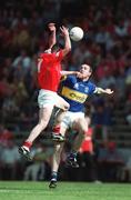 21 July 2002; Graham Canty of Cork in action against Eamon Hanrahan of Tipperary during the Bank of Ireland Munster Football Final Replay match between Cork and Tipperary at Páirc Uí Chaoimh in Cork. Photo by Brendan Moran/Sportsfile