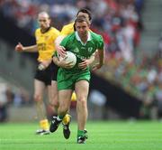 21 July 2002; Cormac Murphy of Meath is tackled by Christy Toye of Donegal during the All-Ireland Senior Football Championship Qualifier Round 4 match between Meath and Donegal at Croke Park. Photo by Brian Lawless/Sportsfile