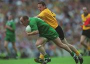 21 July 2002; Ollie Murphy of Meath in action against Raymond Sweeney of Donegal during the All-Ireland Senior Football Championship Qualifier Round 4 match between Meath and Donegal at Croke Park. Photo by Aoife Rice/Sportsfile