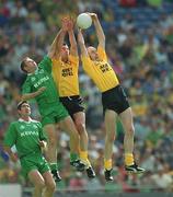 21 July 2002; Paul McGonigle of Donegal wins the ball from team-mate Jim McGuinness and Cormac Murphy of Meath during the All-Ireland Senior Football Championship Qualifier Round 4 match between Meath and Donegal at Croke Park. Photo by Ray McManus/Sportsfile