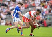 16 July 2017; Callum Brown of Derry in action against Oisin Kiernan of Cavan  during the Electric Ireland Ulster GAA Football Minor Championship Final match between Cavan and Derry at St Tiernach's Park in Clones, Co. Monaghan. Photo by Oliver McVeigh/Sportsfile