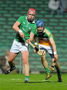 24 March 2012; Niall Maher, Limerick, scores a point despite the efforts of Stephen Wynne, Offaly. Allianz Hurling League, Division 1B, Round 4, Limerick v Offaly, Gaelic Grounds, Limerick. Picture credit: Diarmuid Greene / SPORTSFILE