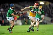 24 March 2012; Thomas Carroll, Offaly, in action against Gavin O'Mahony, Limerick. Allianz Hurling League, Division 1B, Round 4, Limerick v Offaly, Gaelic Grounds, Limerick. Picture credit: Gareth Williams / SPORTSFILE