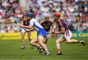 23 July 2017; Michael Walsh of Waterford in action against Willie Devereux of Wexford during the GAA Hurling All-Ireland Senior Championship Quarter-Final match between Wexford and Waterford at Páirc Uí Chaoimh in Cork. Photo by Ray McManus/Sportsfile
