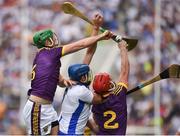 23 July 2017; Matthew O'Hanlon, left, and Willie Devereux of Wexford in action against Austin Gleeson of Waterford during the GAA Hurling All-Ireland Senior Championship Quarter-Final match between Wexford and Waterford at Páirc Uí Chaoimh in Cork. Photo by Cody Glenn/Sportsfile
