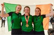 24 July 2017; Michaela Walsh, who won bronze in the Hammer, centre with teammates Mollie O'Reilly, left, and Elizabeth Morland, during the Homecoming of the Irish Team from the European Athletics Under-20 Championships in Italy at Dublin Airport. Photo by Sam Barnes/Sportsfile