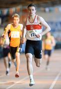 1 April 2012; Ben Cooney, Galway City Harriers A.C., Co. Galway, comes to the line to win the U-19 Boy's 4 x 100m at the Woodie’s DIY AAI Juvenile Indoor Championships of Ireland. Nenagh Indoor Arena, Nenagh, Co. Tipperary. Picture credit: Barry Cregg / SPORTSFILE