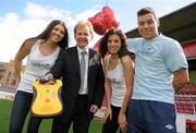 3 April 2012; St. Patrick's Athletic Football Club today linked up with the Joe Kavanagh Foundation. As part of the partnership the Foundation has donated a defibrillator and CPR training to the club. Pictured are St. Patrick's Athletic manager Liam Buckley and player James Chambers, right, with models Julie Kavanagh, left, and Judy Kelleher. Richmond Park, Dublin. Picture credit: David Maher / SPORTSFILE