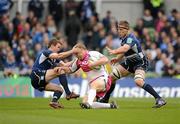 7 April 2012; Scott Andrews, Cardiff Blues, is tackled by Eoin Reddan, left, and Brad Thorn, Leinster. Heineken Cup Quarter-Final, Leinster v Cardiff Blues, Aviva Stadium, Lansdowne Road, Dublin. Picture credit: Stephen McCarthy / SPORTSFILE