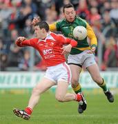 8 April 2012; Adrian Reid, Louth, in action against Micky Burke, Meath. Allianz Football League Division 2, Round 7, Meath v Louth, Pairc Tailteann, Navan, Co. Meath. Picture credit: Brian Lawless / SPORTSFILE