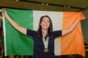 10 April 2012; Caroline Ryan with her bronze medal on her arrival at Dublin airport following the UCI Track Cycling World Championships in Melbourne, Australia. Dublin Airport, Dublin. Picture credit: David Maher / SPORTSFILE