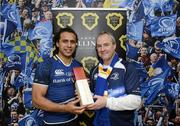 13 April 2012; Isa Nacewa, Leinster, is presented with the Most Valued Player award, sponsored by Bollinger Champagne, by Peter Roycroft, Portfolio Development Manager for Findlater Wine and Spirit Group. Celtic League, Leinster v Edinburgh, RDS, Ballsbridge, Dublin. Picture credit: Stephen McCarthy / SPORTSFILE