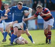 14 April 2012; Robert Sweeney, St. Mary's College, is tackled by Barry O'Mahony and Niall Treston, Clontarf. Ulster Bank League Division 1A, Clontarf v St. Mary's College, Castle Avenue, Clontarf, Dublin. Picture credit: Matt Browne / SPORTSFILE