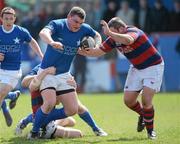 14 April 2012; Robert Sweeney, St. Mary's College, is tackled by Barry O'Mahony and Niall Treston, right, Clontarf. Ulster Bank League Division 1A, Clontarf v St. Mary's College, Castle Avenue, Clontarf, Dublin. Picture credit: Matt Browne / SPORTSFILE