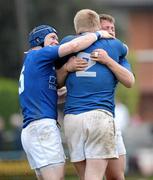 14 April 2012; St. Mary's College players Gavin Dunne, left, Gareth Austin and Richard Sweeney, 2, celebrate after the final whistle. Ulster Bank League Division 1A, Clontarf v St. Mary's College, Castle Avenue, Clontarf, Dublin. Picture credit: Matt Browne / SPORTSFILE