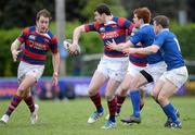 14 April 2012; Richie Lane, Clontarf, gets the ball away to Evan Ryan as he is tackled by Conor Hogan and Stephen Grissing, right, St. Mary's College. Ulster Bank League Division 1A, Clontarf v St. Mary's College, Castle Avenue, Clontarf, Dublin. Picture credit: Matt Browne / SPORTSFILE