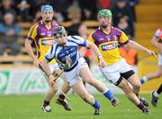 15 April 2012; Darren Maher, Laois, in action against Matthew O'Hanlon, Wexford. Allianz Hurling League Division 1B Relegtion Play-off, Wexford v Laois, Nowlan Park, Kilkenny. Picture credit: Brian Lawless / SPORTSFILE