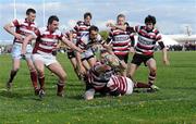 15 April 2012; Hughie O'Neill, Enniscorthy RFC, scores his side's second try despite the tackle of Rob Porter, Tullow RFC. Provincial Towns Cup Final, Tullow RFC v Enniscorthy RFC, Portarlington RFC, Portarlington, Co Laois. Picture credit: Matt Browne / SPORTSFILE