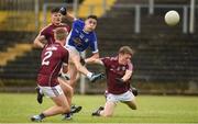 5 August 2017; Philip Rogers of Cavan in action against, from left, Eoin McFadden, Brian Harlowe and Jack Glynn of Galway during the Electric Ireland All-Ireland GAA Football Minor Championship Quarter-Final match between Cavan and Galway at Páirc Seán Mac Diarmada in Carrick-on-Shannon, Leitrim. Photo by Barry Cregg/Sportsfile