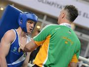 16 April 2012; Adam Nolan, Ireland, with head coach Billy Walsh at the end of the first round, during his Welterweight 69kg bout against Tomasz Kot, Poland, . AIBA European Olympic Boxing Qualifying Championships, Hayri Gür Arena, Trabzon, Turkey. Picture credit: David Maher / SPORTSFILE