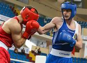 16 April 2012; Adam Nolan, Ireland, right, exchanges punches with Tomasz Kot, Poland, during their Welterweight 69kg bout. AIBA European Olympic Boxing Qualifying Championships, Hayri Gür Arena, Trabzon, Turkey. Picture credit: David Maher / SPORTSFILE
