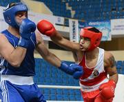 16 April 2012; Tommy McCarthy, Ireland, right, exchanges punches with Colpa Alem, Bosnia & Herzegovina, during their Heavyweight 91kg bout. AIBA European Olympic Boxing Qualifying Championships, Hayri Gür Arena, Trabzon, Turkey. Picture credit: David Maher / SPORTSFILE