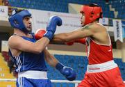 16 April 2012; Tommy McCarthy, Ireland, right, exchanges punches with Colpa Alem, Bosnia & Herzegovina, during their Heavyweight 91kg bout. AIBA European Olympic Boxing Qualifying Championships, Hayri Gür Arena, Trabzon, Turkey. Picture credit: David Maher / SPORTSFILE