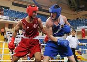 16 April 2012; Joe Ward, Ireland, right, exchanges punches with Bahram Muzaffer, Turkey, during their Light Heavyweight 81kg bout. AIBA European Olympic Boxing Qualifying Championships, Hayri Gür Arena, Trabzon, Turkey. Picture credit: David Maher / SPORTSFILE