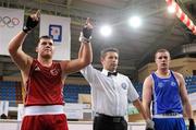 16 April 2012; Erhan Aci, Turkey, is declared the winner over Con Sheehan, Ireland, after their Super Heavyweight 91+kg bout. AIBA European Olympic Boxing Qualifying Championships, Hayri Gür Arena, Trabzon, Turkey. Picture credit: David Maher / SPORTSFILE