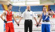 17 April 2012; David Oliver Joyce, Ireland, is declared the winner over Artur Bril, Germany, after their Lightweight 60kg bout. AIBA European Olympic Boxing Qualifying Championships, Hayri Gür Arena, Trabzon, Turkey. Picture credit: David Maher / SPORTSFILE