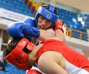 17 April 2012; David Oliver Joyce, Ireland, left, exchanges punches with Artur Bril, Germany, during their Lightweight 60kg bout. AIBA European Olympic Boxing Qualifying Championships, Hayri Gür Arena, Trabzon, Turkey. Picture credit: David Maher / SPORTSFILE