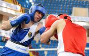 17 April 2012; David Oliver Joyce, left, Ireland, exchanges punches with Artur Bril, Germany, during their Lightweight 60kg bout. AIBA European Olympic Boxing Qualifying Championships, Hayri Gür Arena, Trabzon, Turkey. Picture credit: David Maher / SPORTSFILE